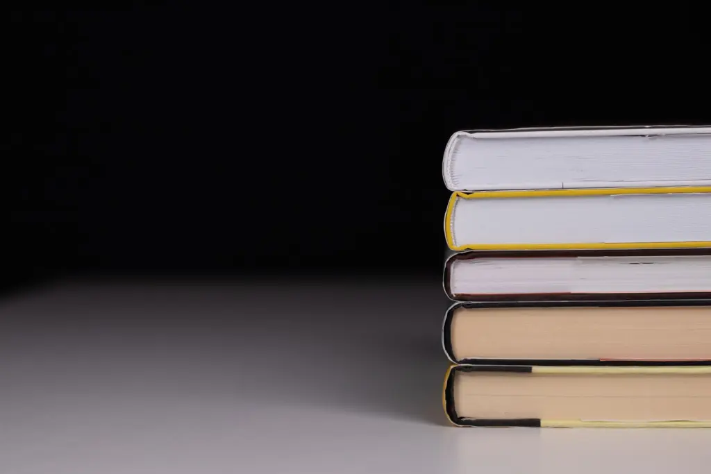Stack of hardcover books ready for a book launch landing page