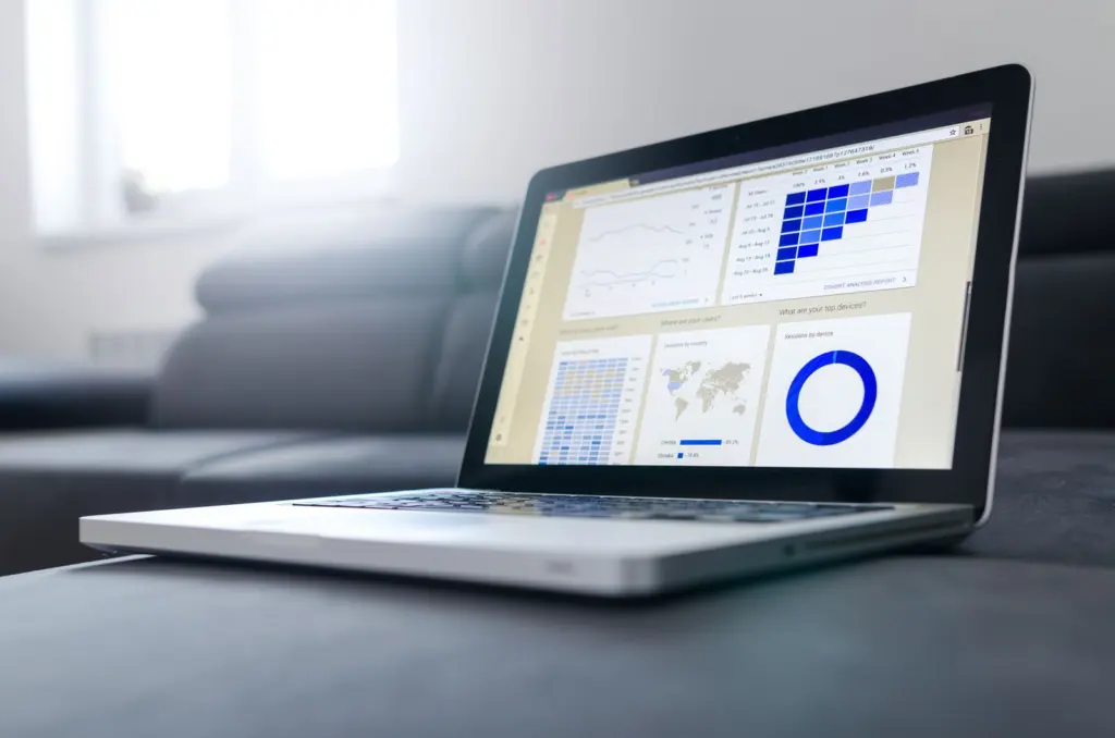 Laptop showing analytics charts used to track website leads